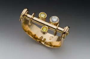 Canary Yellow and White Diamond Kinetic Ring
