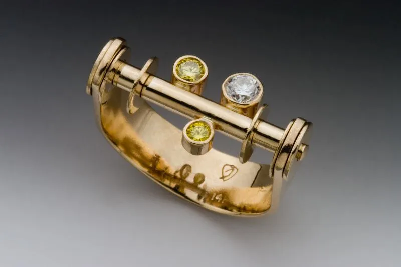 Canary Yellow and White Diamond Kinetic Ring