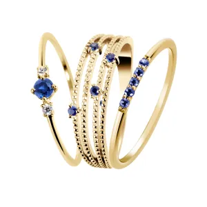 Composition of rings in 925 Silver gilded with 18k yellow gold assembled with blue Sapphire and Zirconium Oxide