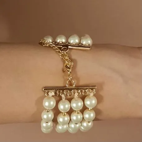 Estele Gold Plated Glowing Four Line White Pearl Bracelet for Girls & Women
