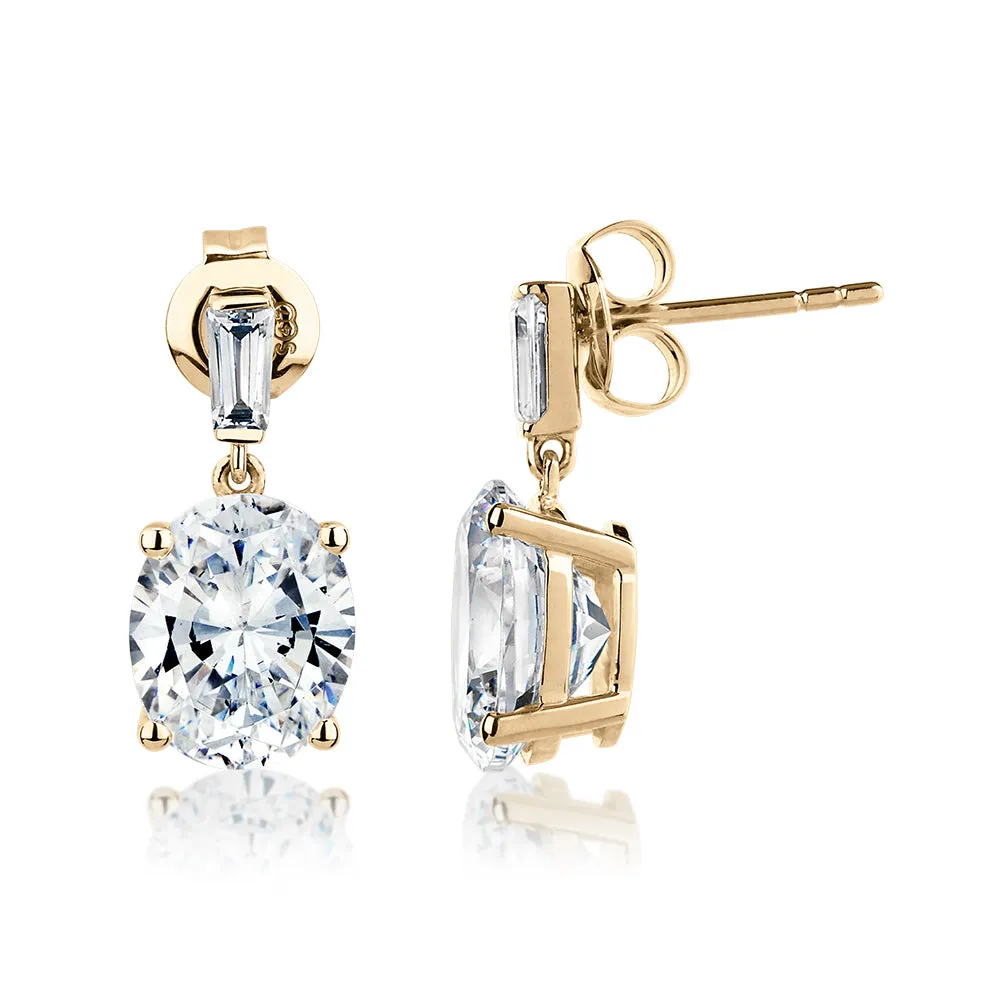 Oval and Baguette drop earrings with 5.50 carats* of diamond simulants in 10 carat yellow gold