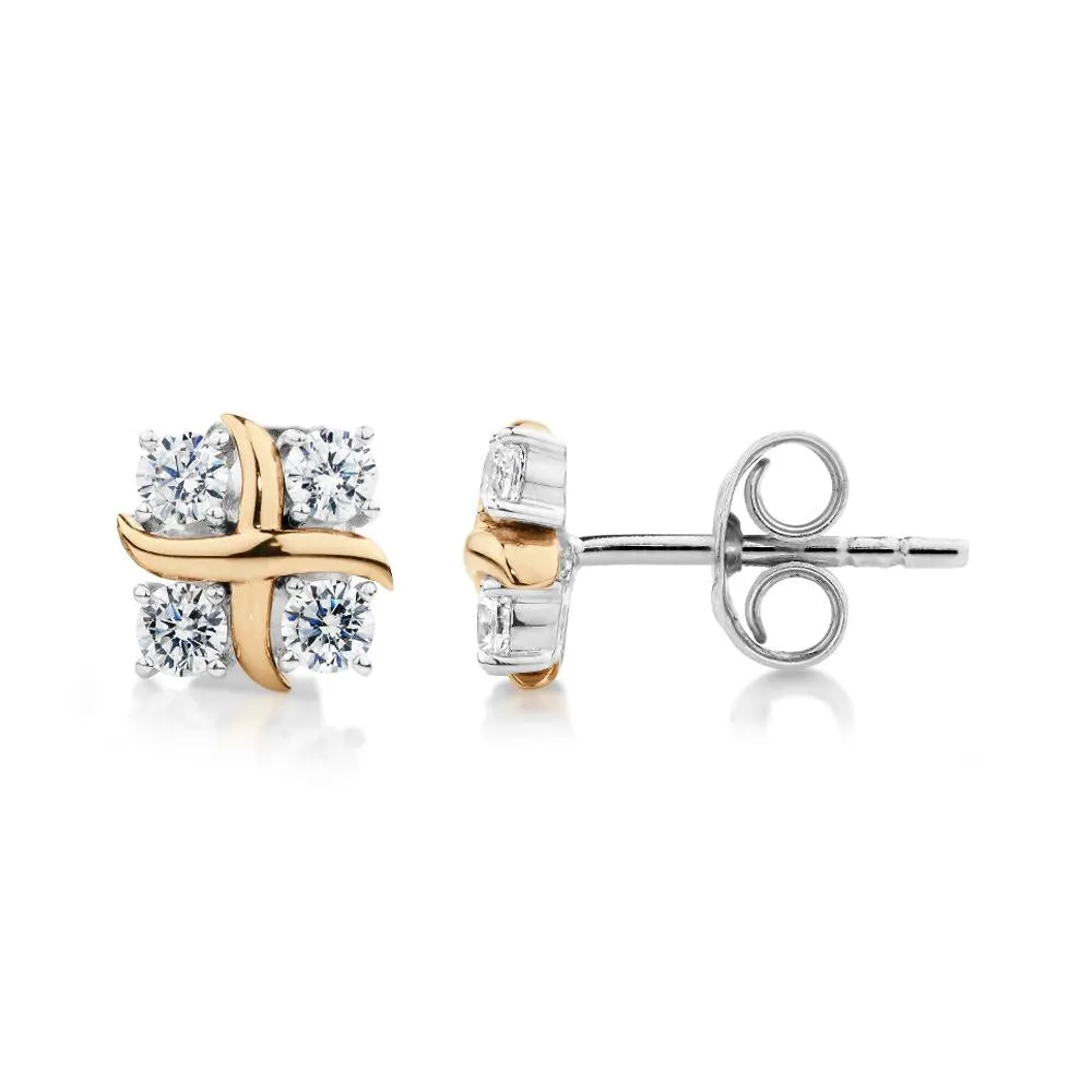 Round Brilliant fancy earrings with 0.48 carats* of diamond simulants in 10 carat yellow gold and sterling silver