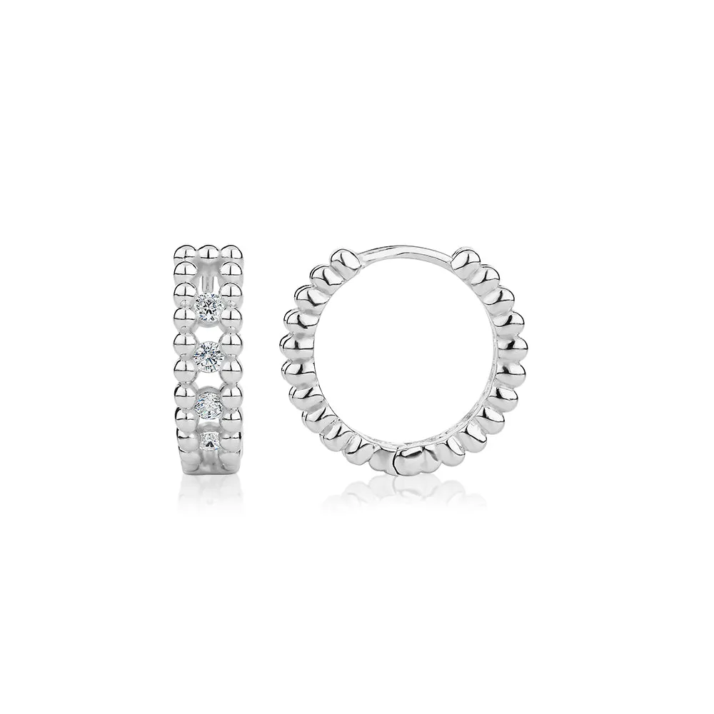 Round Brilliant hoop earrings with 0.48 carats* of diamond simulants in sterling silver