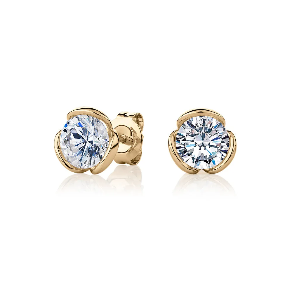 Round Brilliant stud earrings with 2 carats* of diamond simulants in 10 carat yellow gold