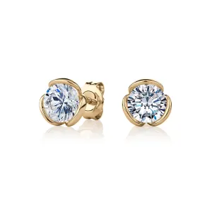 Round Brilliant stud earrings with 2 carats* of diamond simulants in 10 carat yellow gold