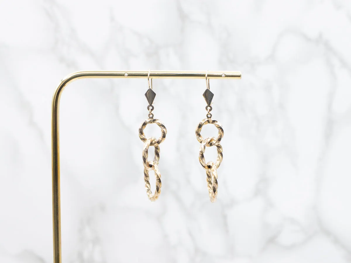 Twisting Graduating Gold Ring Drop Earrings