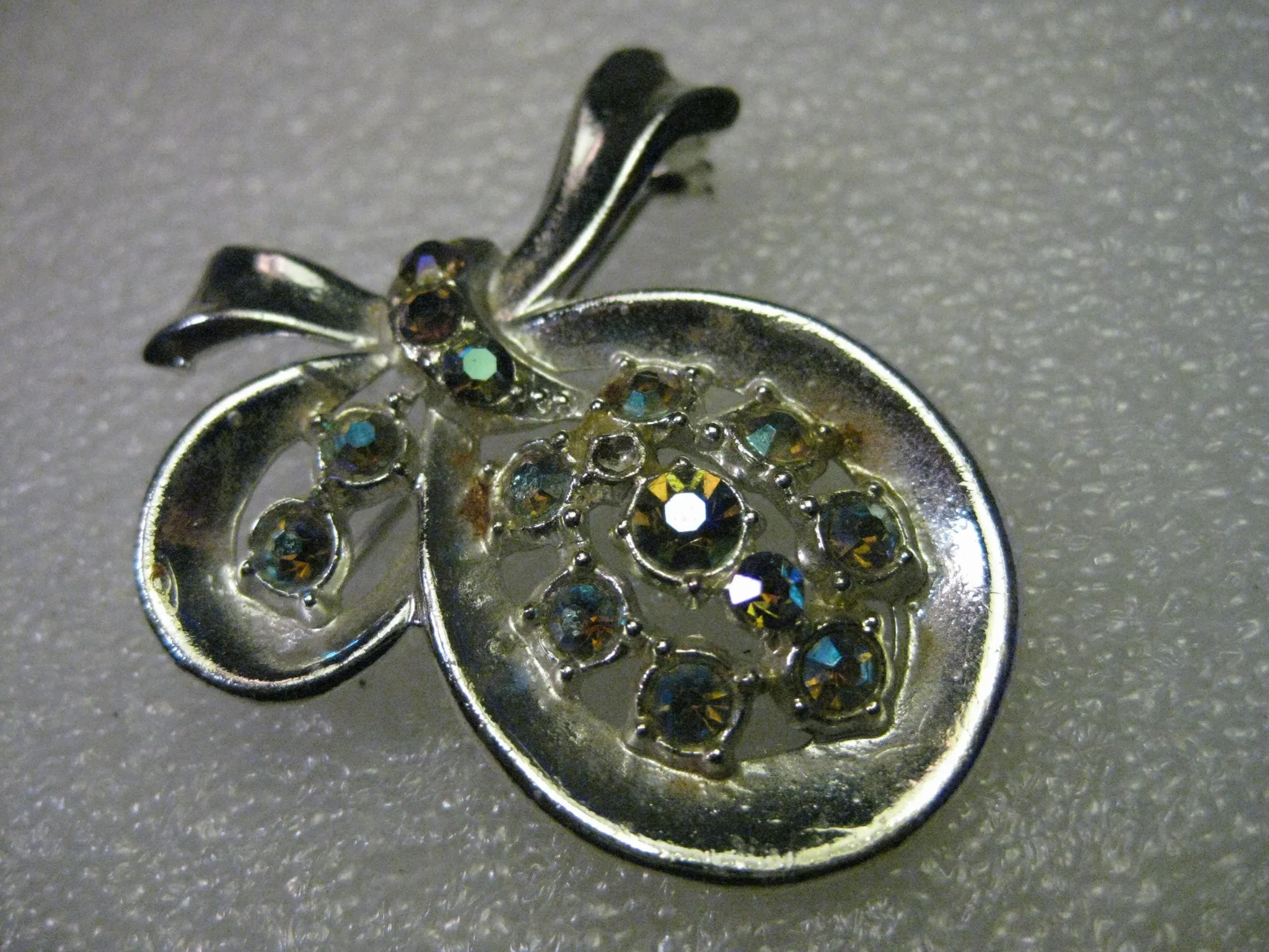 Vintage 1950's Silvertone Bow Brooch with Aurora Borealis Blue Rhinestones -