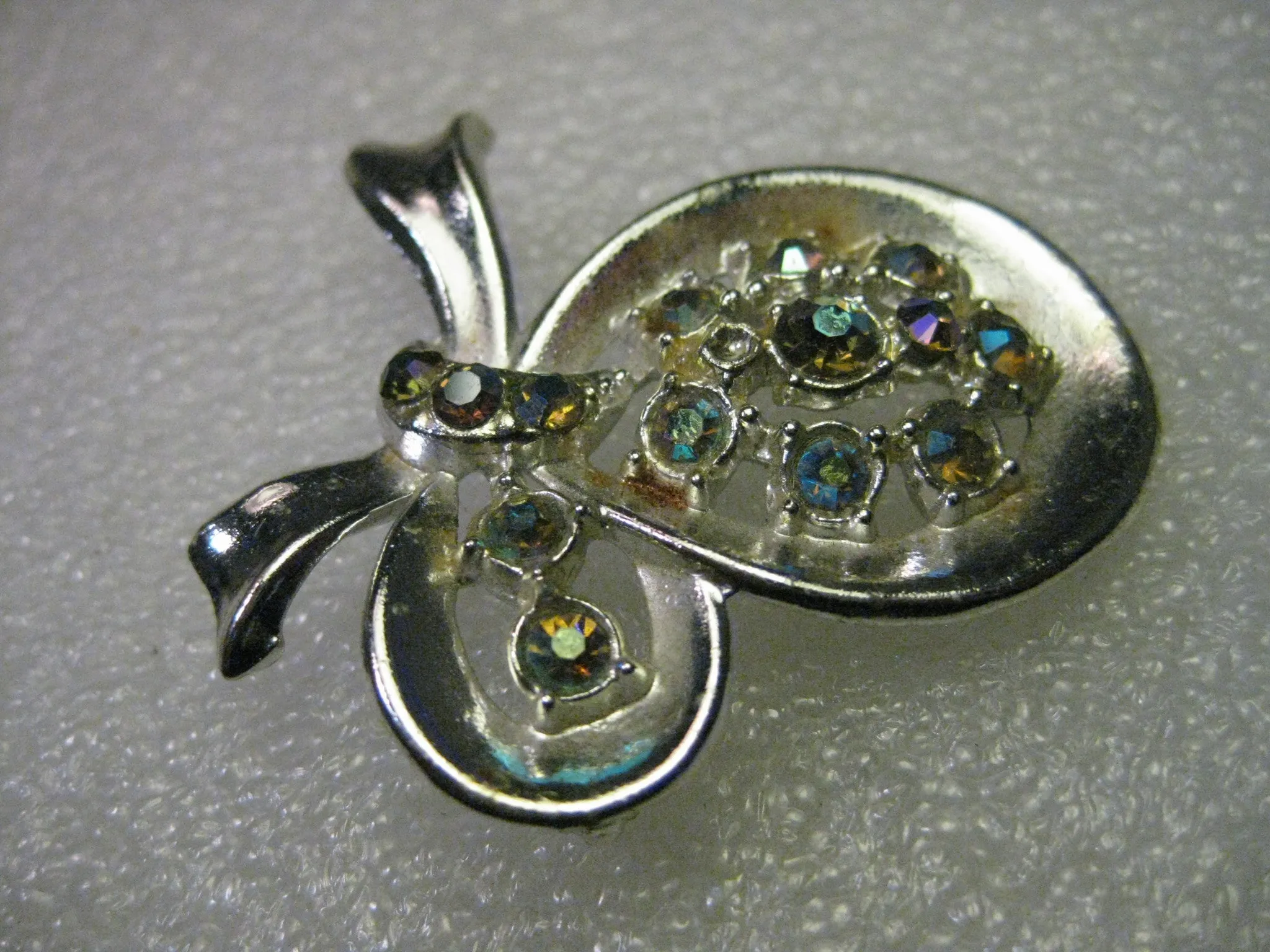 Vintage 1950's Silvertone Bow Brooch with Aurora Borealis Blue Rhinestones -