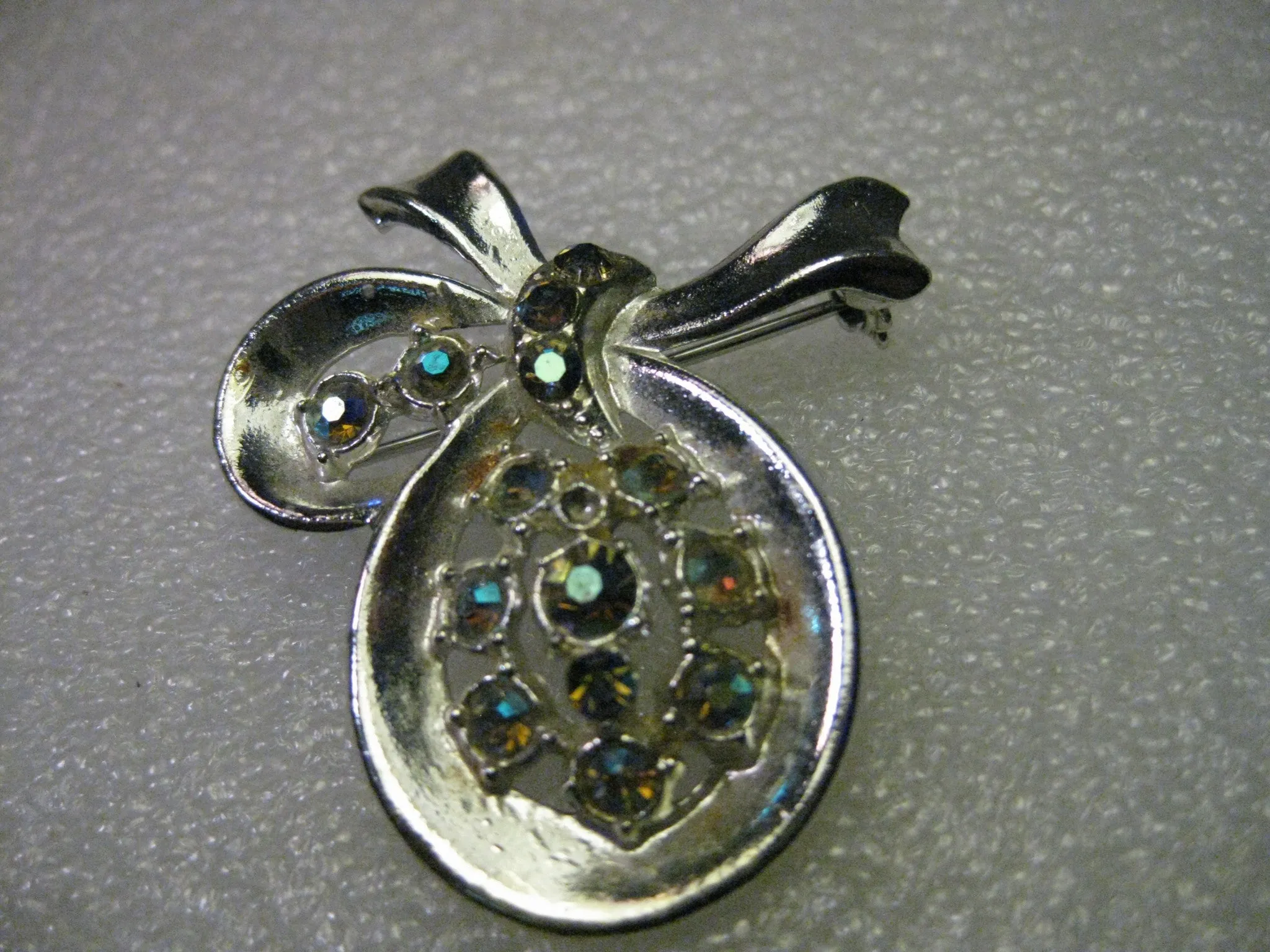 Vintage 1950's Silvertone Bow Brooch with Aurora Borealis Blue Rhinestones -