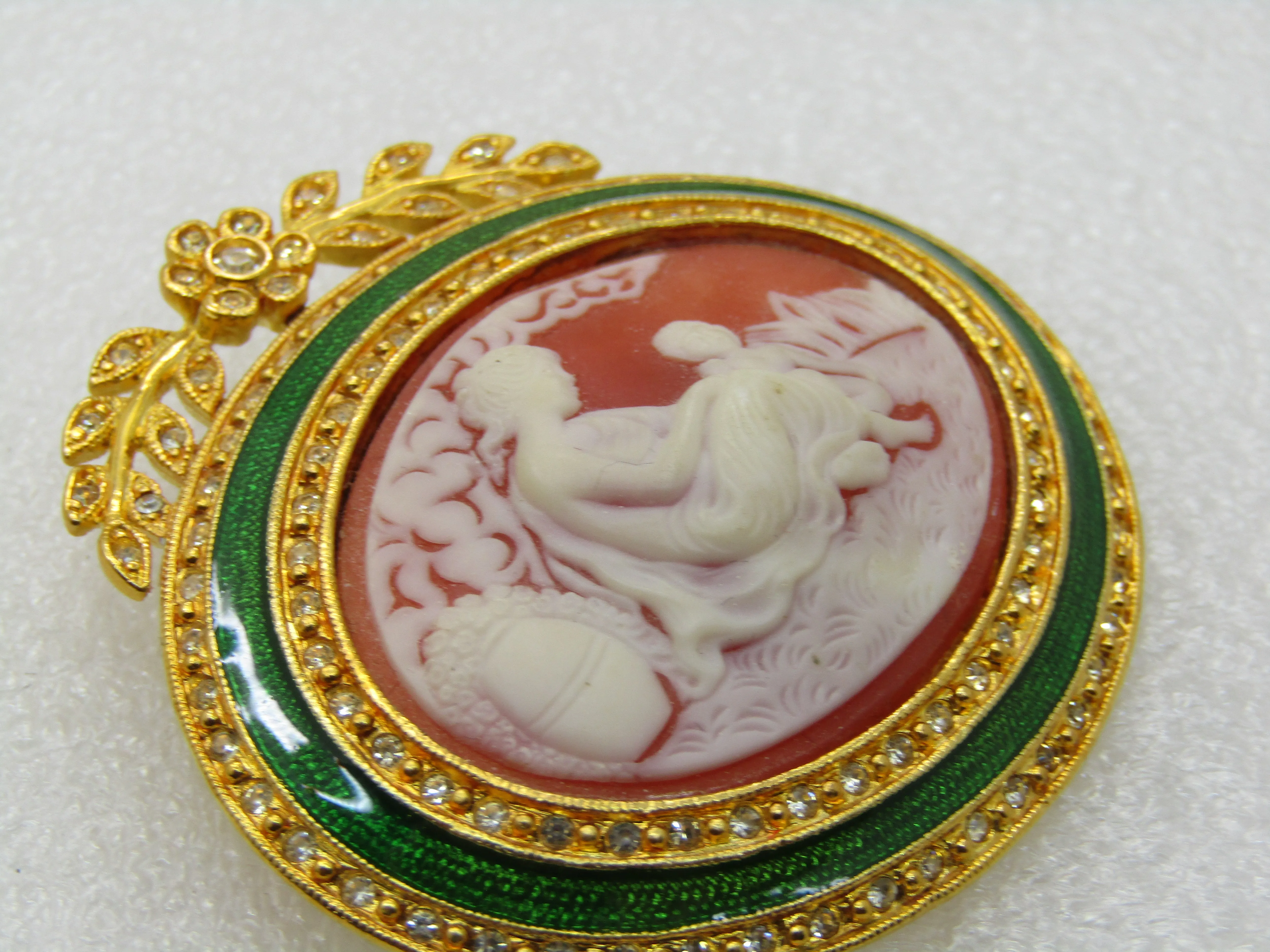 Vintage Joan Rivers Vintage Joan Rivers Enameled Rhinestone Framed Cameo Brooch, Floral Swag